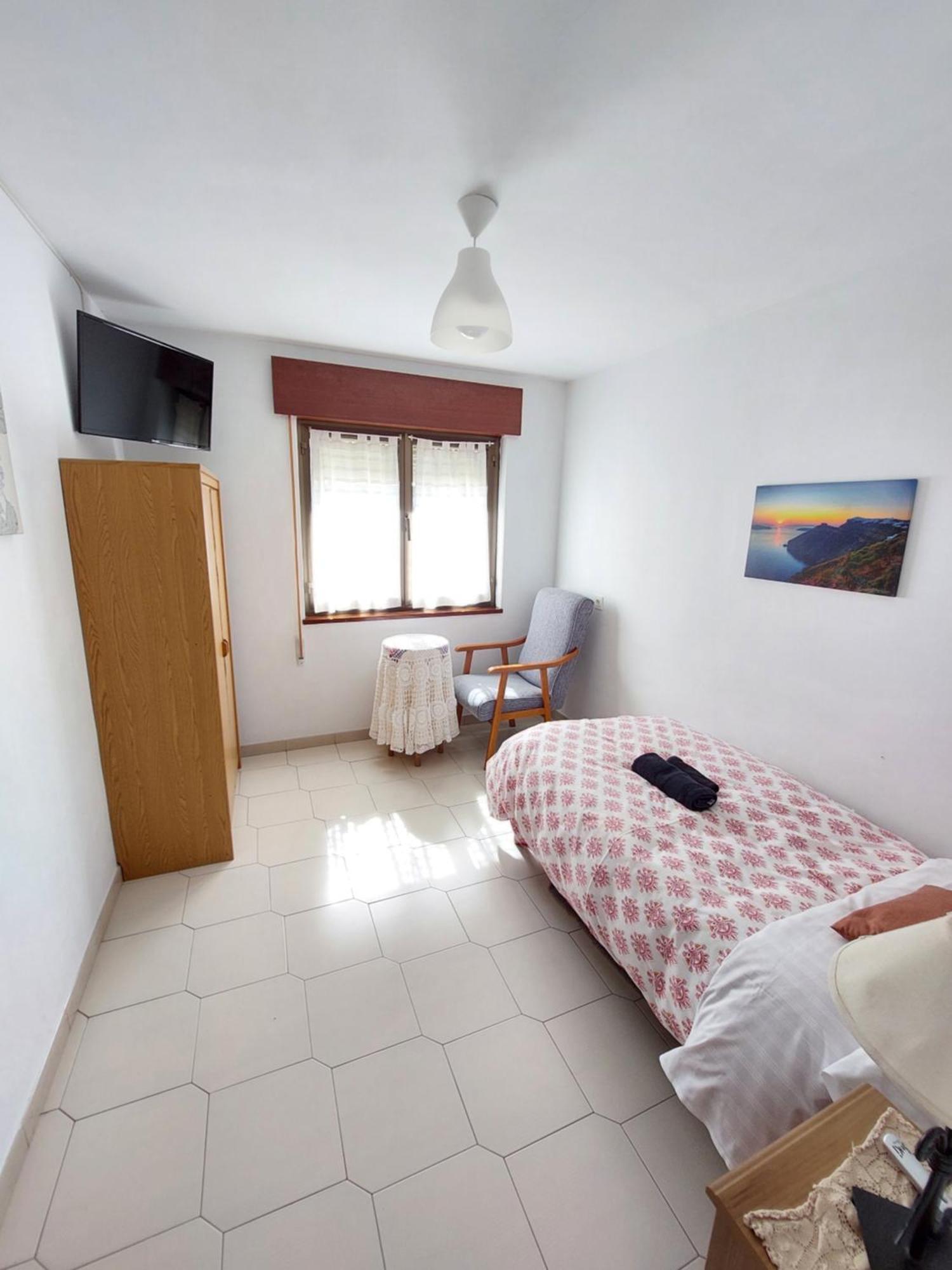 Habitación Individual con baño compartido
